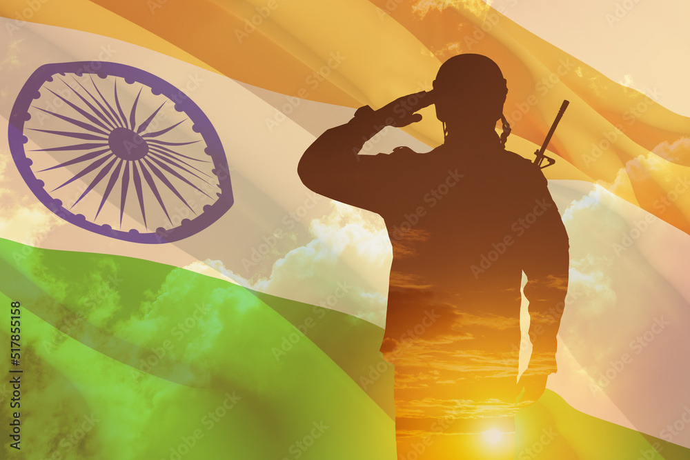 Double exposure of Silhouette of a solider and the sunset or the sunrise against India flag. Greeting card for Independence day, Republic Day. India celebration.