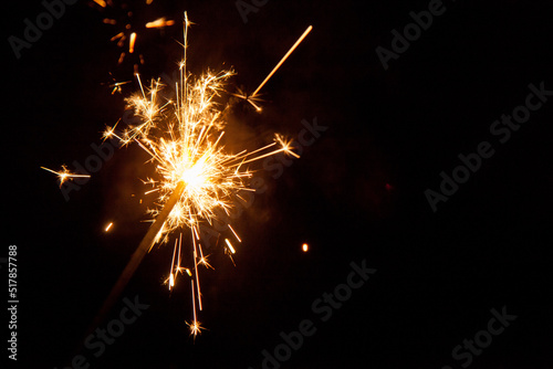 Sparkler shooting out sparks photo