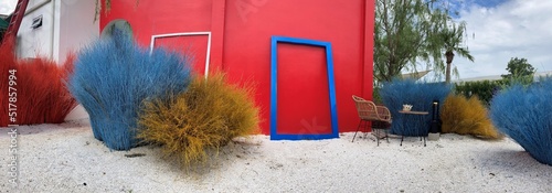 Rock garden background decoration. Blue hay. Photo frame. Fresh wall. Sky. modern garden