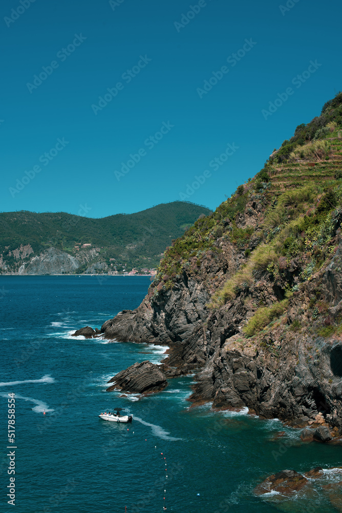 turquoise sea shore in Vernazza, Italy 