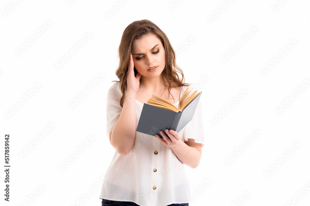 The girl is reading an interesting book. The girl is reading an interesting book.