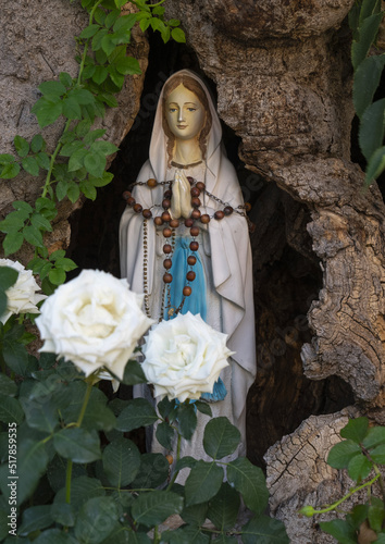 Virgin Mary statue in front of a house, Governorate of North Lebanon, Qnat, Lebanon photo
