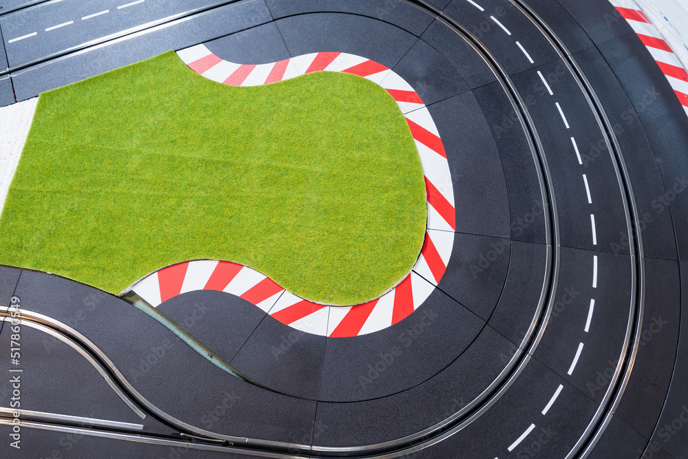 The toy race track. Miniature race cars on a race track. racing