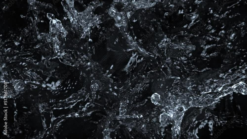 Super Slow Motion Shot of Splashing Water Isolated on Black Background at 1000 fps.