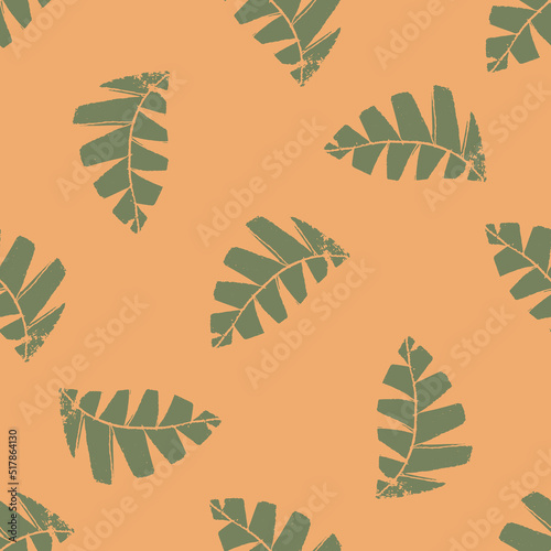 Mono print style scattered leaves seamless vector pattern background. Textured cut out grunge foliage green orange backdrop. Hand crafted painterly design. Organic nature all over print for summer
