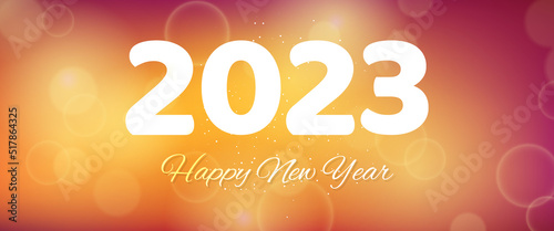 Happy new year 2023 incription on blurred background