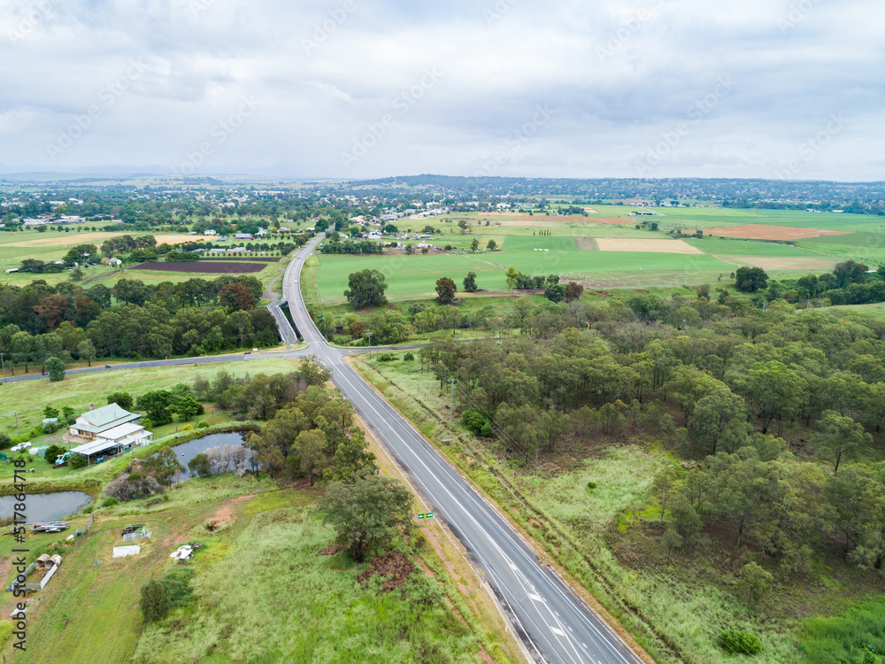 Intersection of country roads going to bridge towards town of Singleton Intersection of country roads going to bridge towards town of Singleton