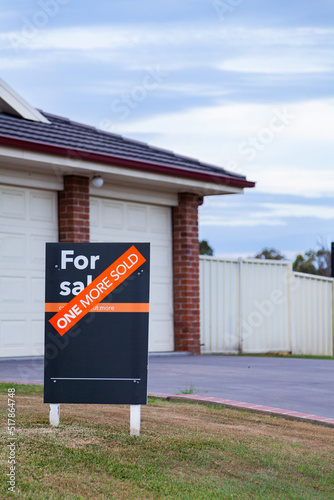Sign outside of house saying sold