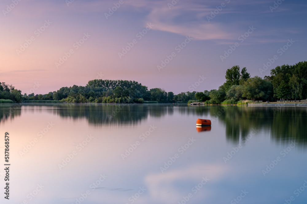Shortly after sunset at Giftener See. Red buoy as foreground subject. Shortly after sunset at Giftener See. Red buoy as foreground subject.