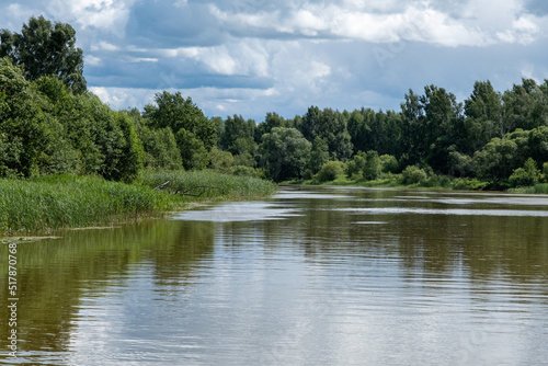 Emajogi, the largest river in Estonia. flows through the second largest city, Tartu. Summer time beautiful scenic environment photo