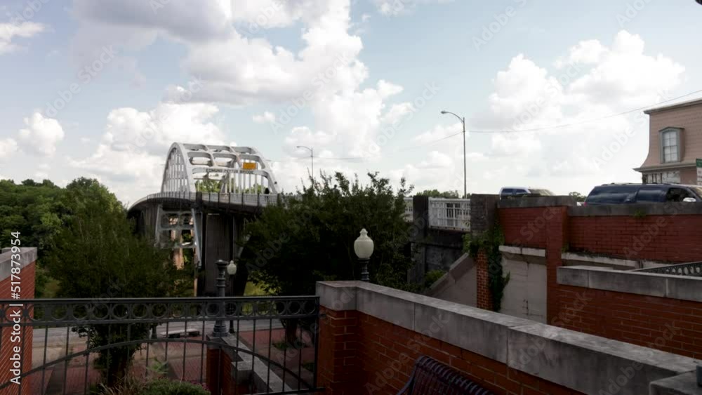 Edmund Pettus bridge in Selma, Alabama with gimbal video walking forward in plaza with slow motion. Edmund Pettus bridge in Selma, Alabama with gimbal video walking forward in plaza with slow motion.