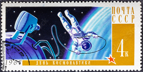 RUSSIA - CIRCA 1967: stamp printed by Russia, shows planet and astronaut, circa 1967. photo