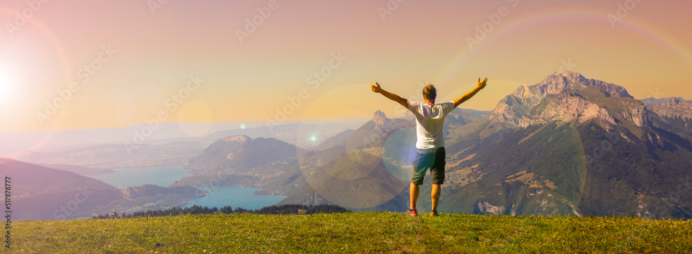 man enjoying beautiful view of the Annecy lake