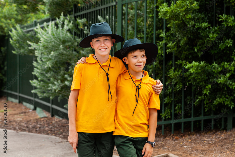 Two school boys with arms around each other Two school boys with arms around each other