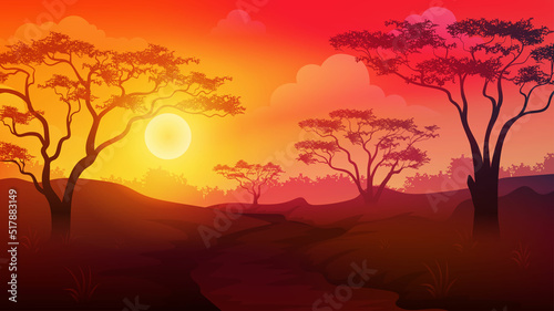 Sunset or sunrise in Africa savanna landscape with trees and grass