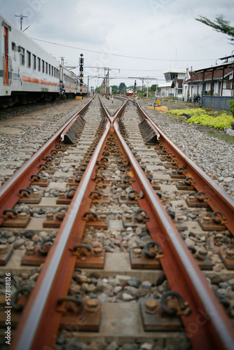 railway tracks in the station in java Indonesia. Railroad switch / turnout. Railway tracks with switches and interchanges at a main line station
