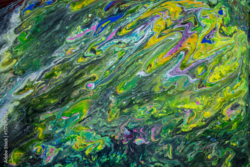 Marbled texture created with acrylic paint and watercolors mixed with water forming organic, rounded and sinuous structures perfect for backgrounds and graphic resources