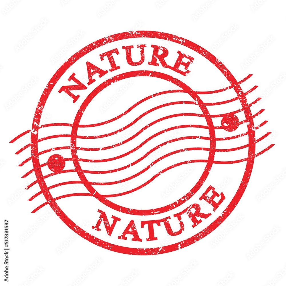 NATURE, text written on red postal stamp. NATURE, text written on red postal stamp.
