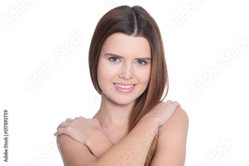 Portrait of beautiful young woman posing isolated