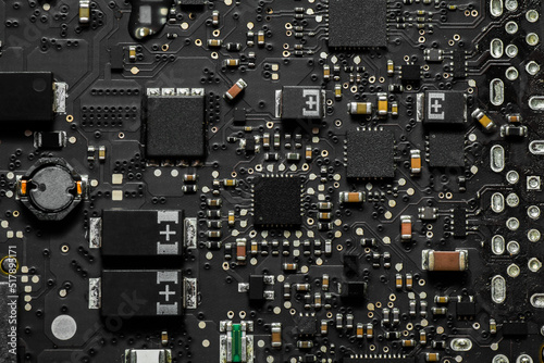 Close up of Circuit board with many chips technology on computer laptop circuit