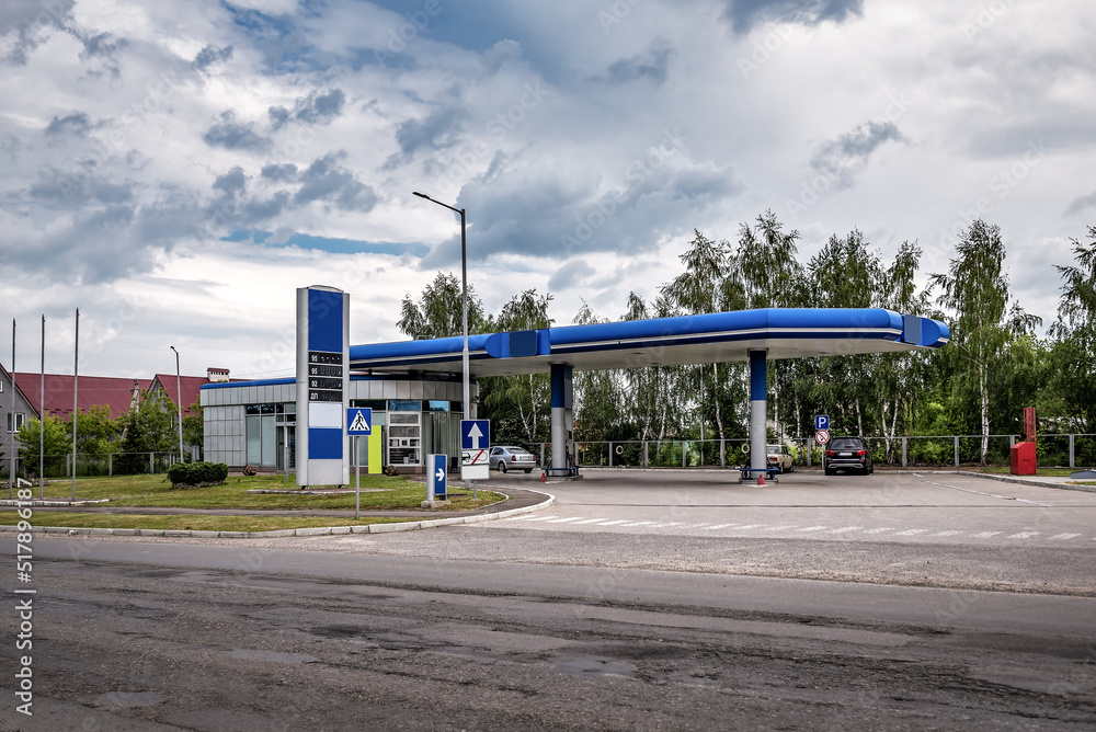 Gas station under cloudy sky