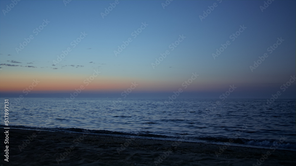 Beautiful view beach washed sea waves at evening. Amazing nature background. Beautiful view beach washed sea waves at evening. Amazing nature background.