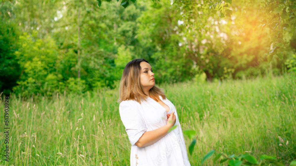 Portrait of a young beautiful brunette in the park Portrait of a young beautiful brunette in the park