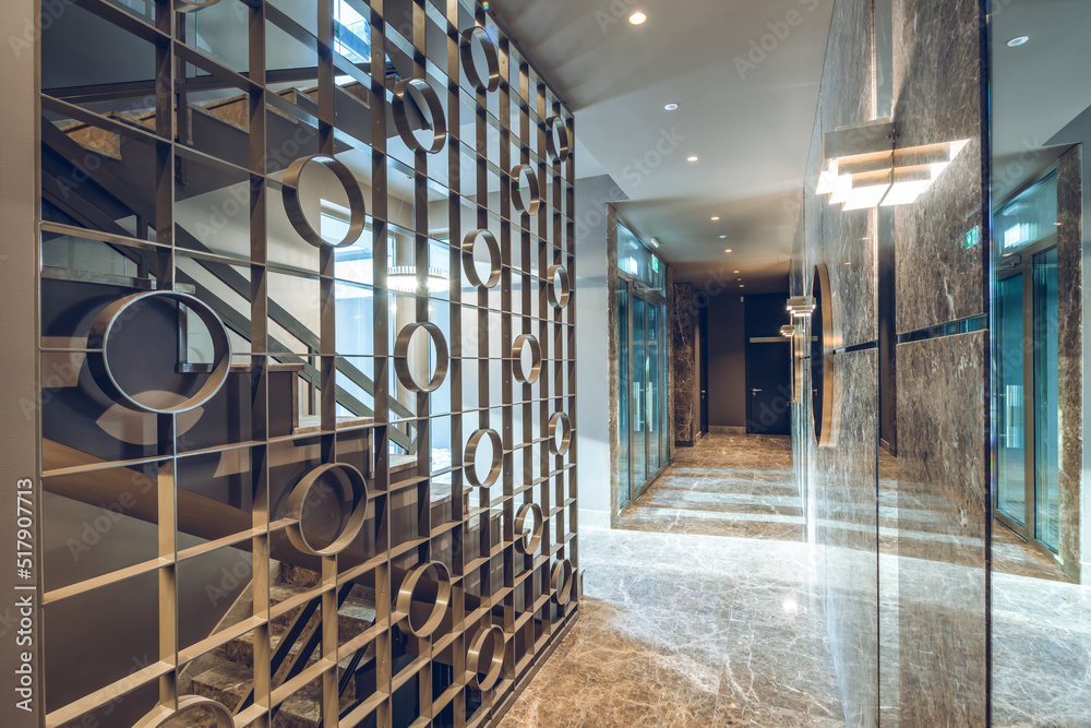Modern marble interior of entrance hall in luxury residential building ...