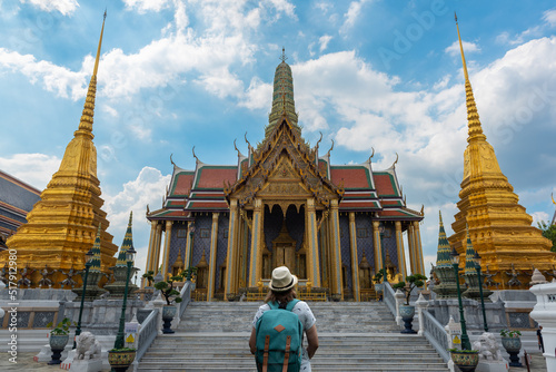 Traveler woman at Wat Phra Kaew, Emerald Buddha temple, Bangkok Thailand.