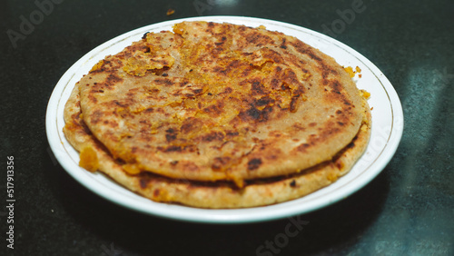 Puranpoli on the occasion of Holi Festival also known as Holige, is an Indian sweet flatbread. Puran puri, Puran poli, Holige, Obbattu, or Bobbattlu, is a traditional Indian sweet. photo