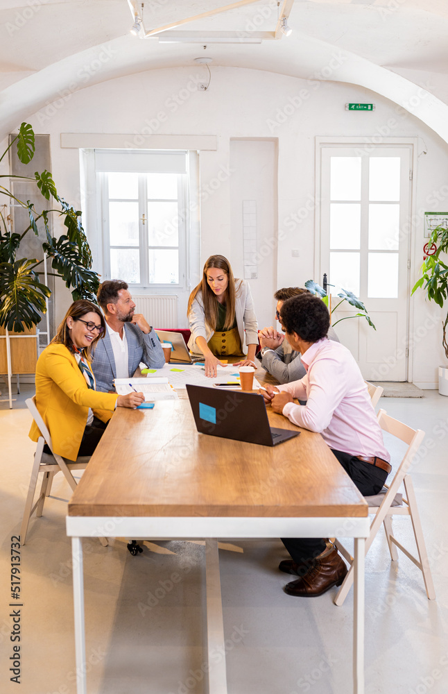 Group of business people working in office. Group of business people working in office.