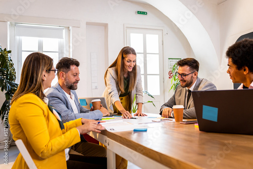 Group of business people working in office.