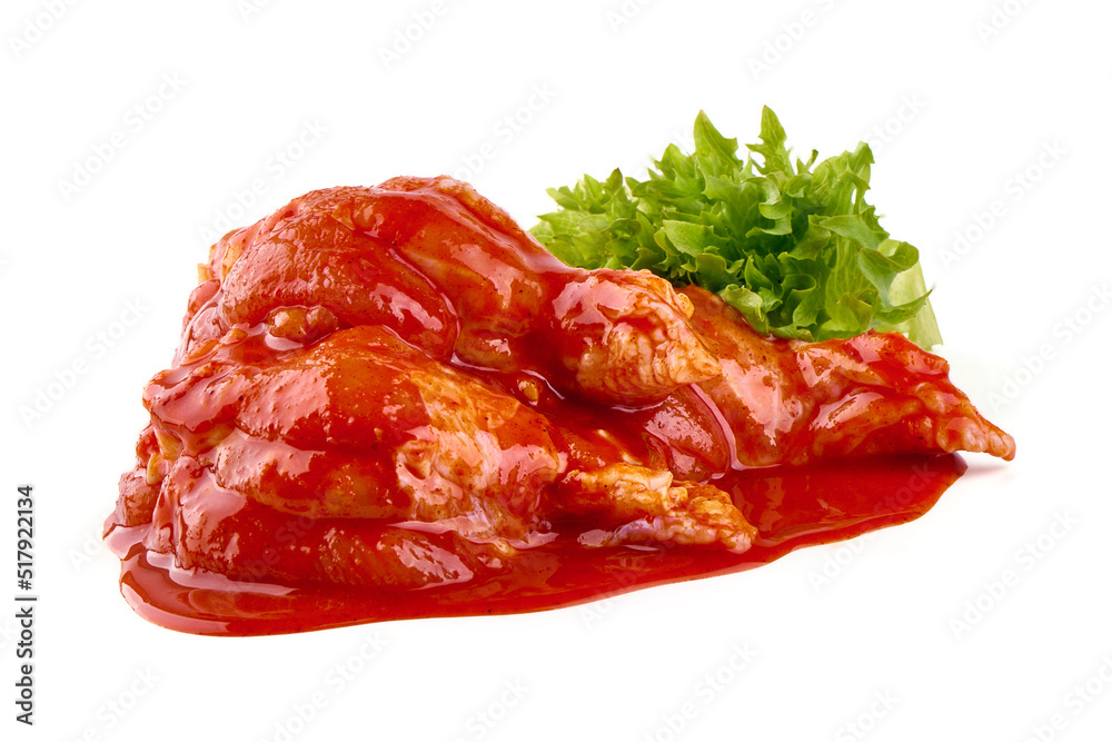 Spicy chicken legs for bbq in red sauce, isolated on white background. Spicy chicken legs for bbq in red sauce, isolated on white background.