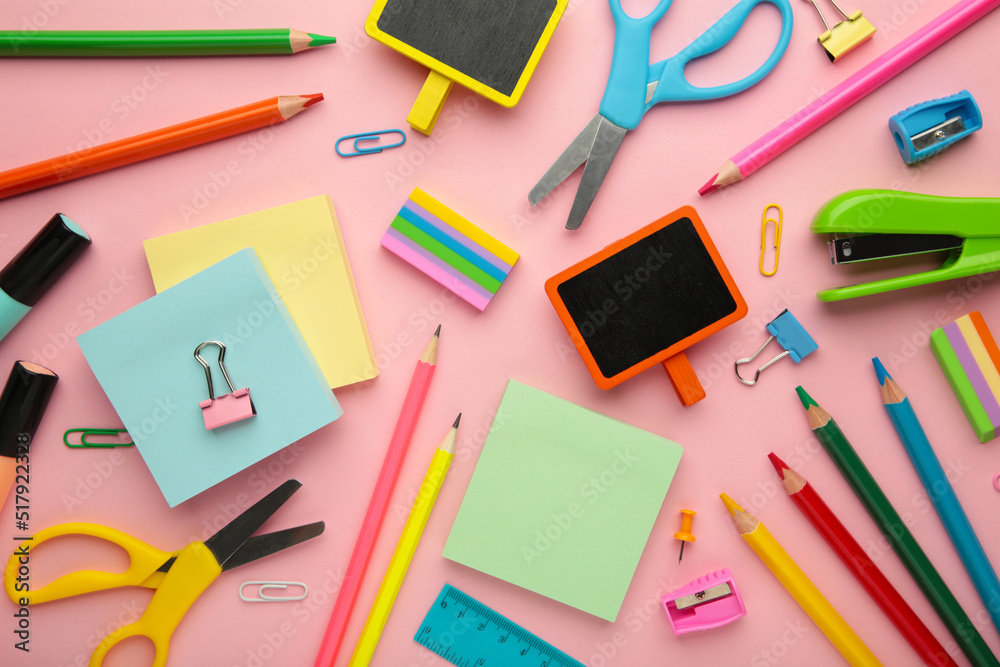 School supplies on pink background. Back to school concept. School supplies on pink background. Back to school concept.