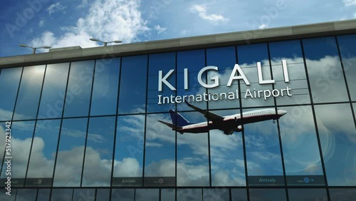 Plane landing at Kigali, Rwanda 3D. Arrival in the city with the glass airport terminal and reflection of the jet aircraft. Travel, business, tourism and transport concept. photo