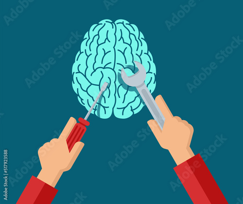 Psychiatrist working with brain using hand tools