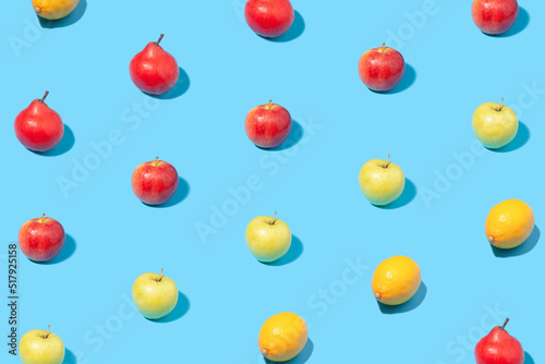 Fototapeta Naklejka Na Ścianę i Meble -  Summer pattern of ripe fruits on blue background.
