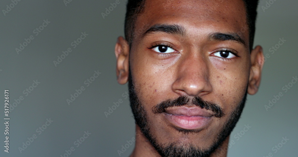 Fototapeta premium Friendly African american male portrait face close-up
