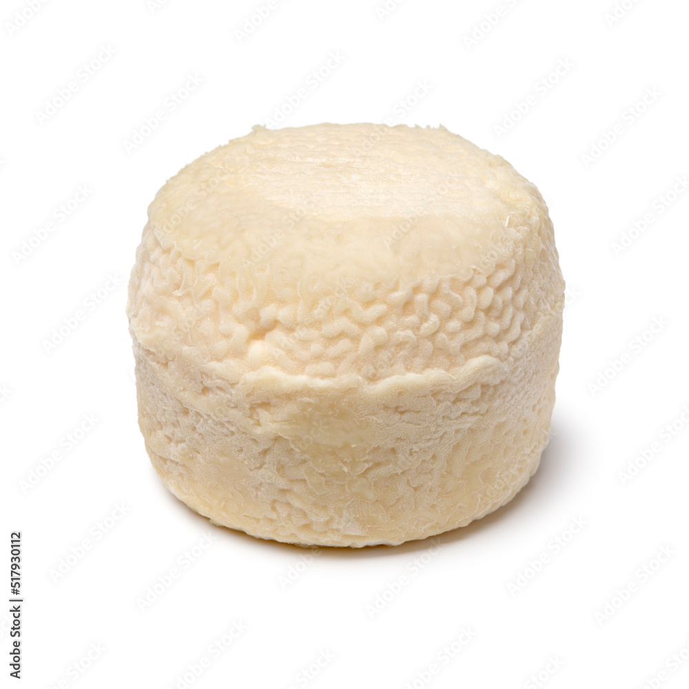 Single traditional small whole goat cheese isolated on white background close up Single traditional small whole goat cheese isolated on white background close up