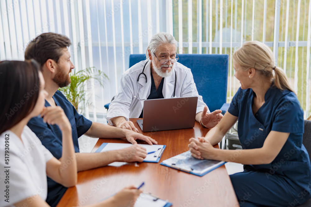 Successful medical doctors are discussing diagnosis during the conference Successful medical doctors are discussing diagnosis during the conference
