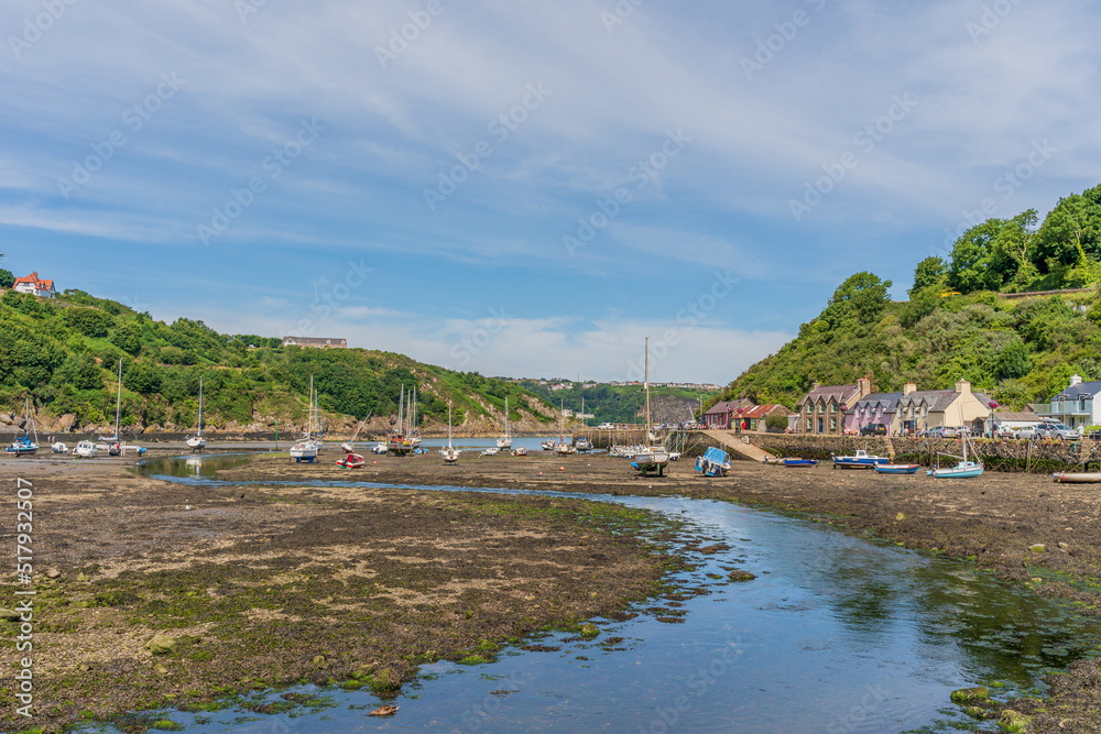 Landscape of  Fishguard lower town harbor during low tide on he coast of Pembrokeshire, in Wales, UK