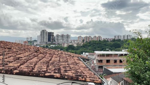 City in Colombia. Buildings and architecture Colombia. Residential apartment building. House roof. Urban. Sunny day. photo