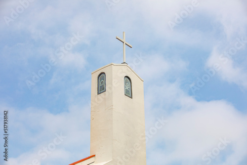 church steeple against blue sky