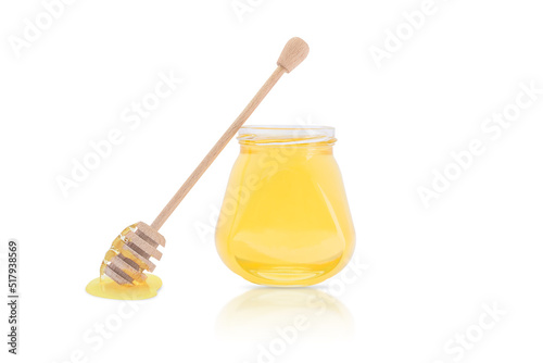 Isolate a jar of honey with a stick for honey