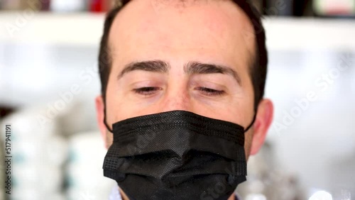 Close up portrait of charming mature man in medical face mask