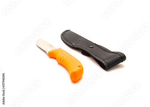 Sheath and deer hunting knife with thermoplastic rubber orange handle and razor sharp stainless steel blade isolated on white background