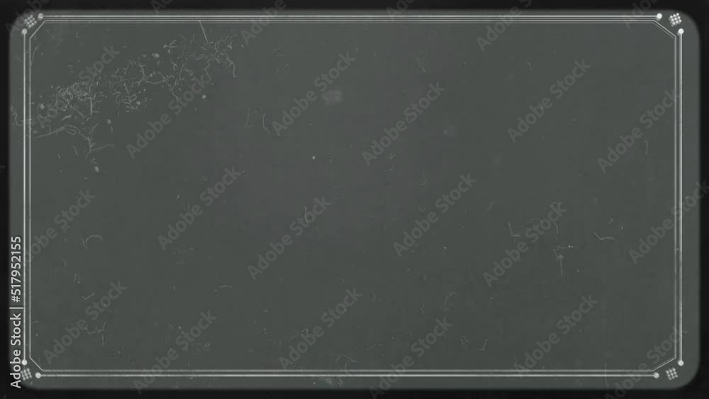 Retro effect on gray background. A re-created film frame from the silent movies era. Scratched film.