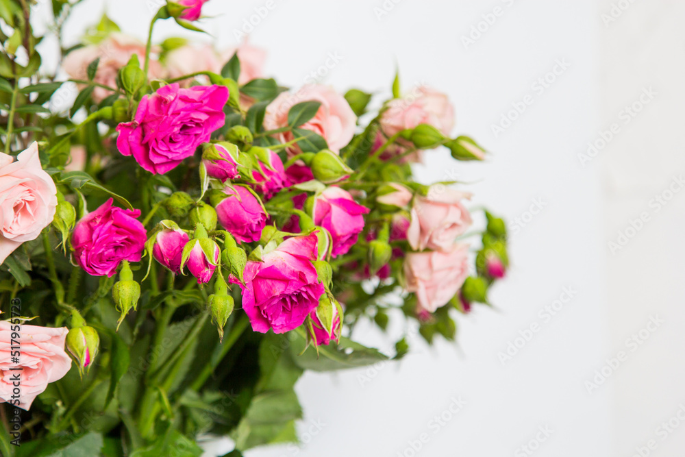 Wilted bouquet of flowers isolated on a white background