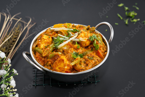 Vegetable Jalfrezi is packed with a multitude of vegetables, including bell peppers, carrots, cottage cheese, cauliflowers beans etc,   photo