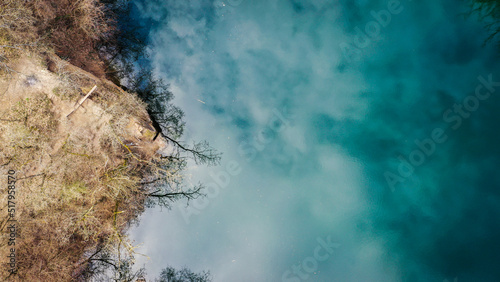 aerial view of blue lake between mountains